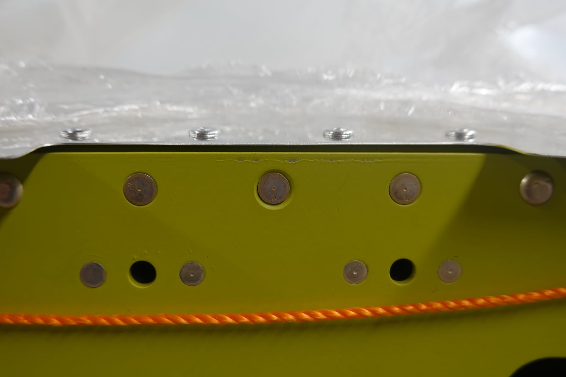 Up close of the incorrectly countersunk rivets. The middle one is really bad, and I was going to ask my technical counselor about this as well.
