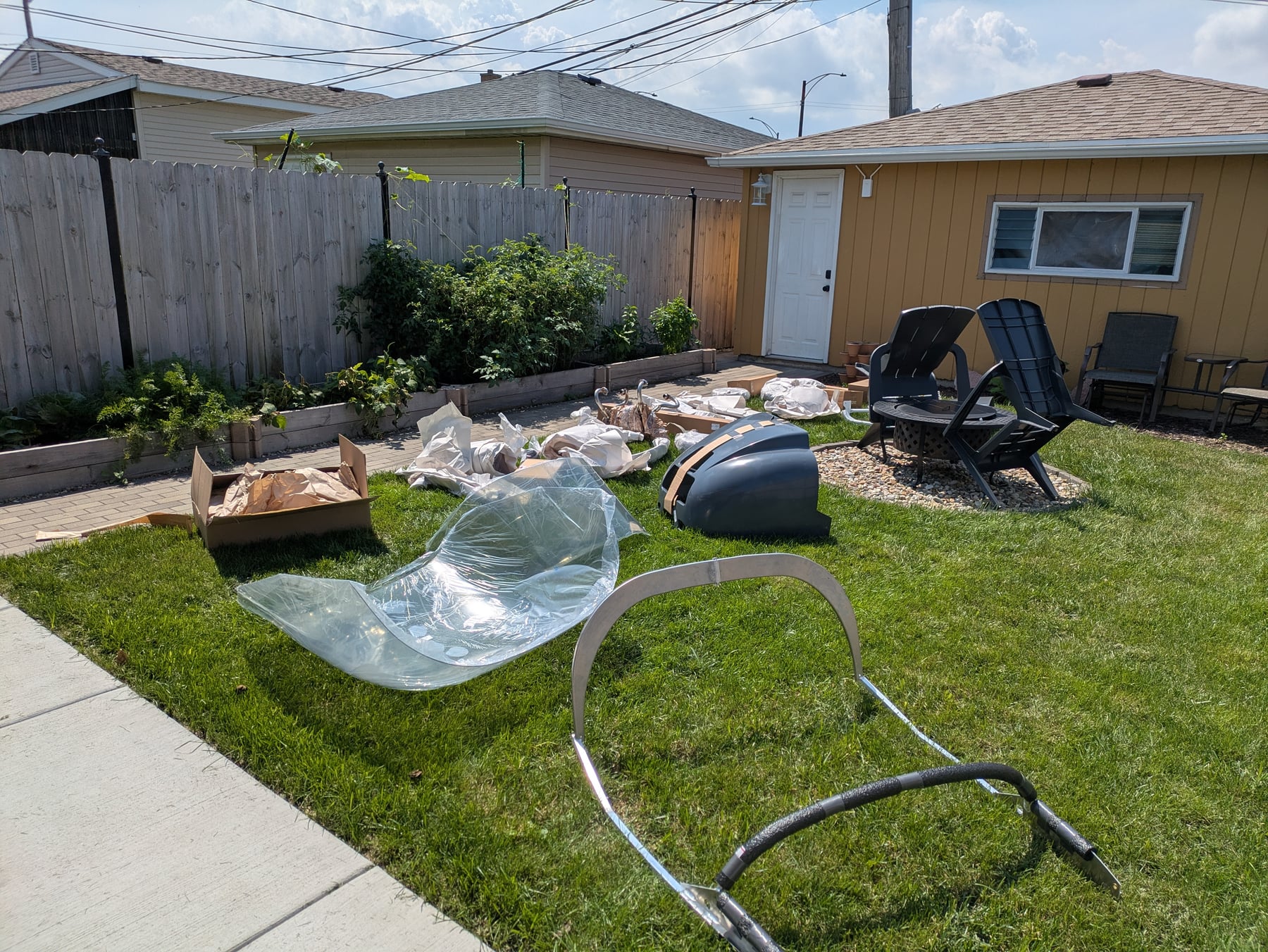 All of the pieces unpacked in the backyard before being brought inside for inventorying.