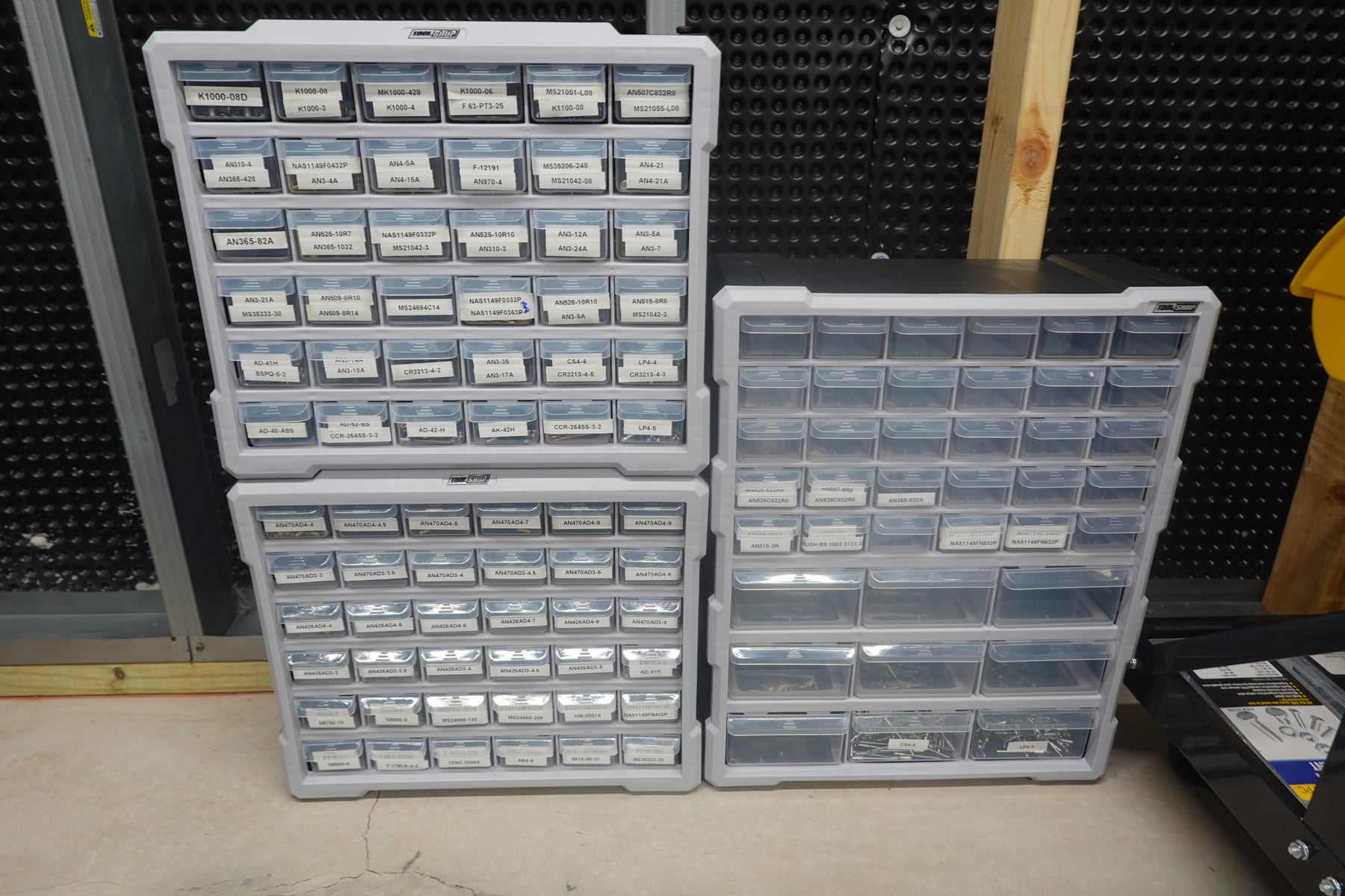 Fasteners counted, labeled, and organized.